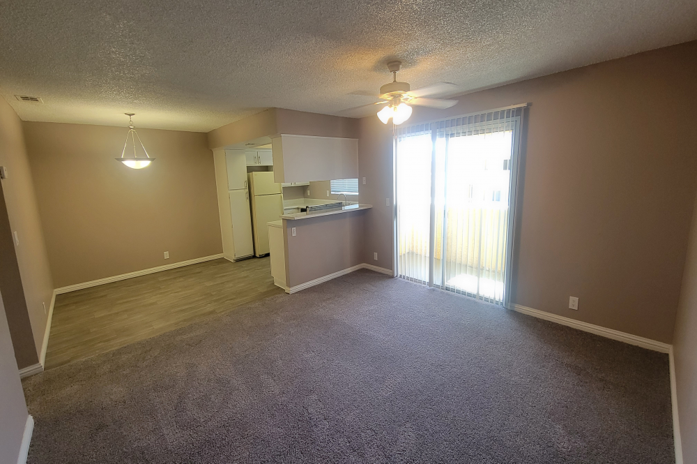 2x2 Bedroom photo of Sunset Springs apartment Living Room 1