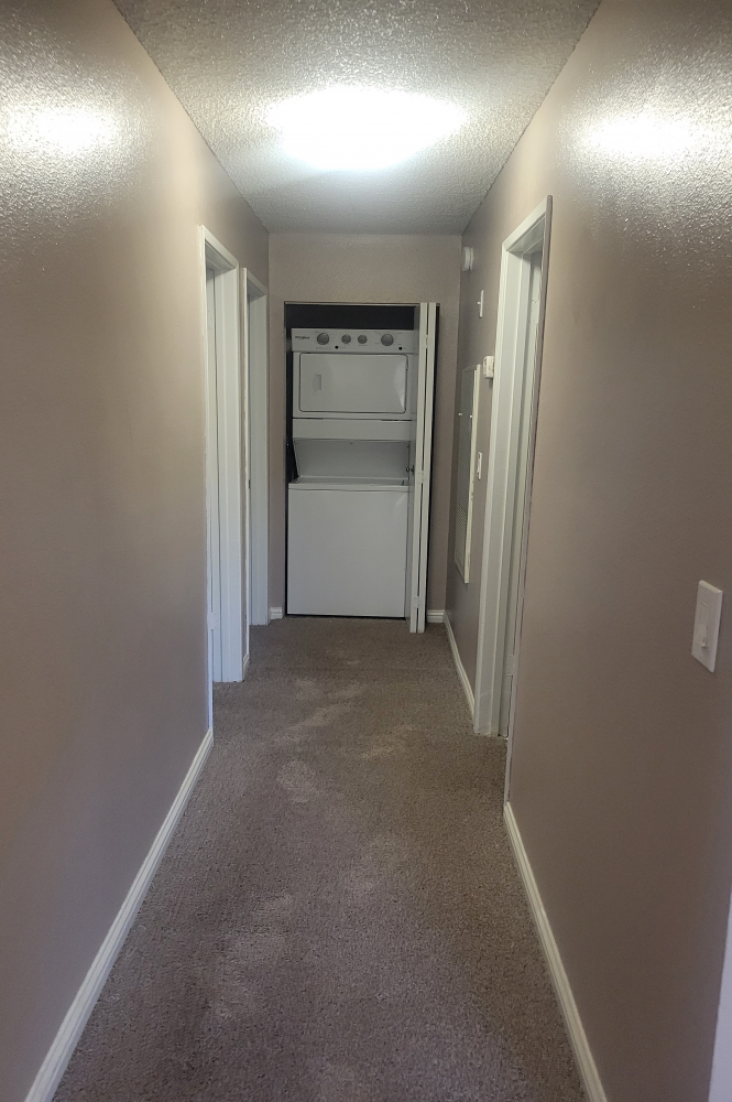 3x2 Bedroom photo of Sunset Springs apartment Utility Room 1
