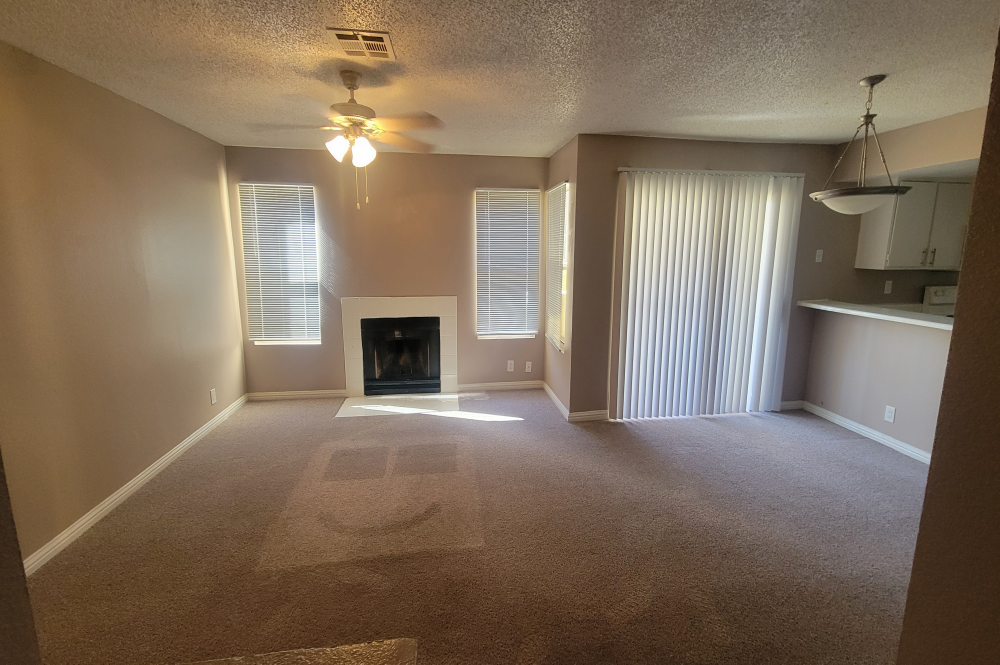 3x2 Bedroom photo of Sunset Springs apartment Living Room 1