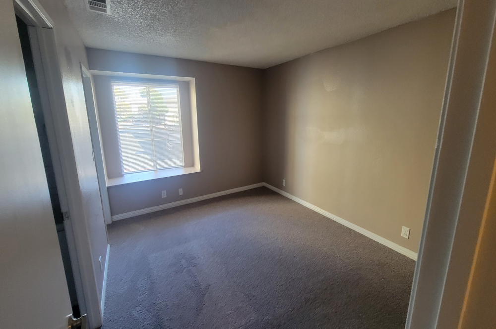 3x2 Bedroom photo of Sunset Springs apartment Bedroom 4