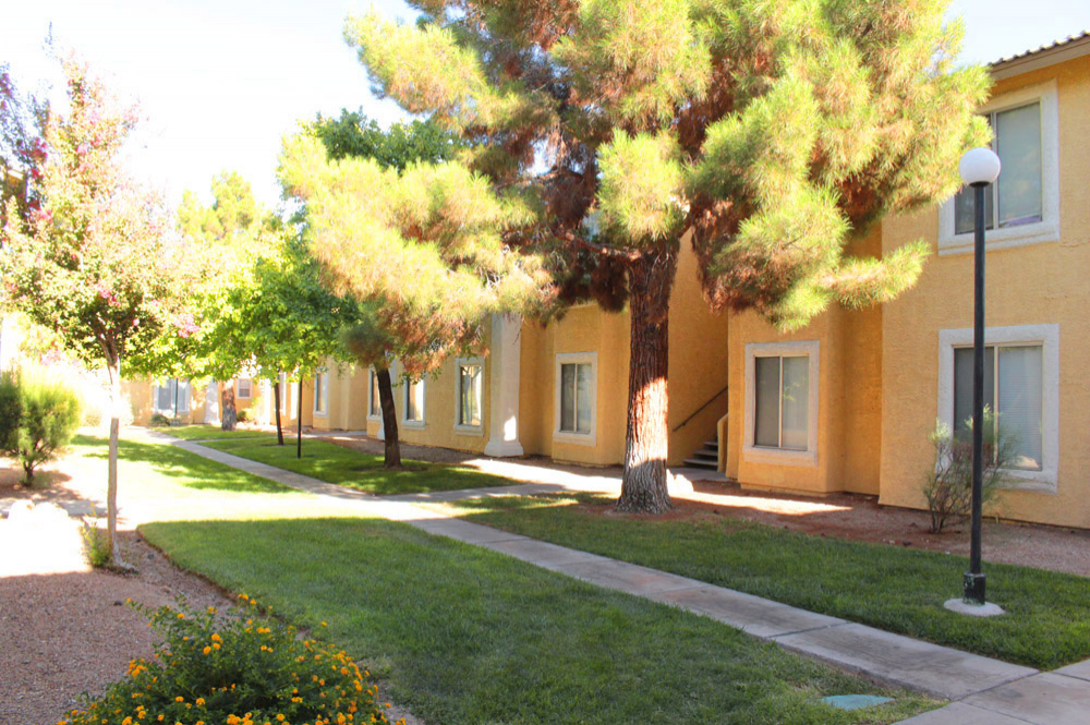 Exterior photo of Sunset Springs apartment Landscaping and Walkway 1